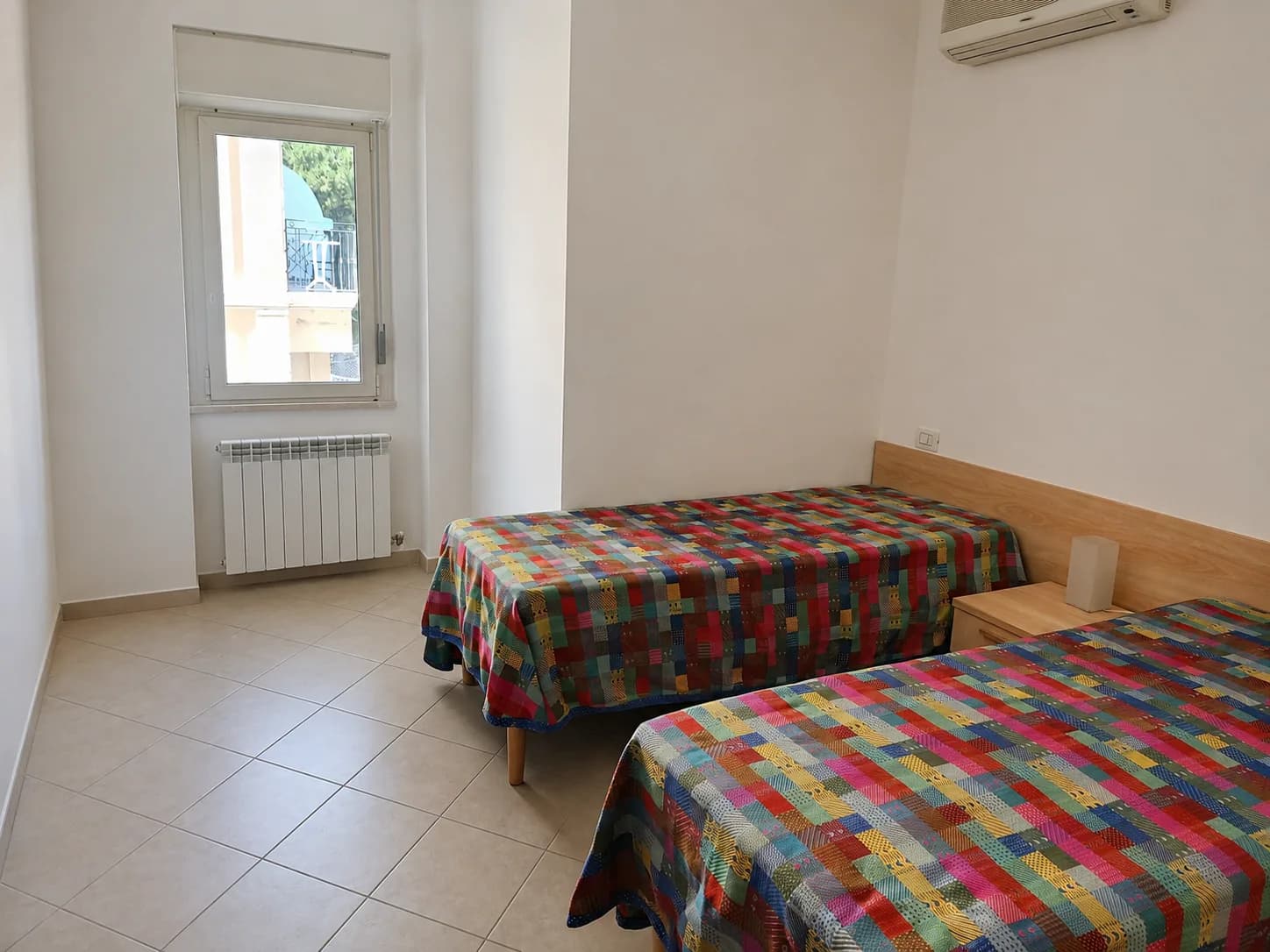 Seconda camera da letto dell’appartamento Bellavista Blu